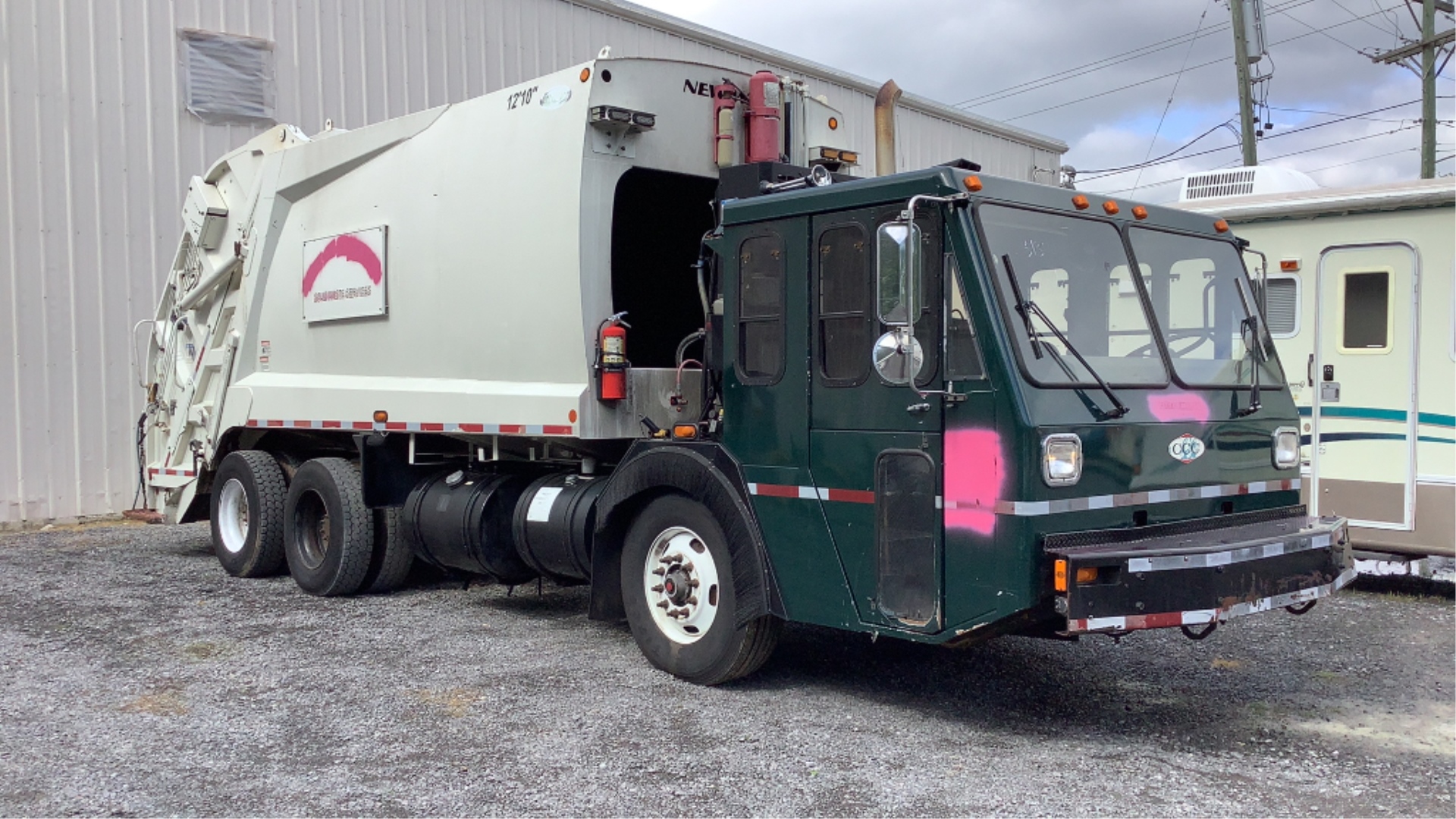 2011 Crane Carrier Company Low Entry Garbage Truck