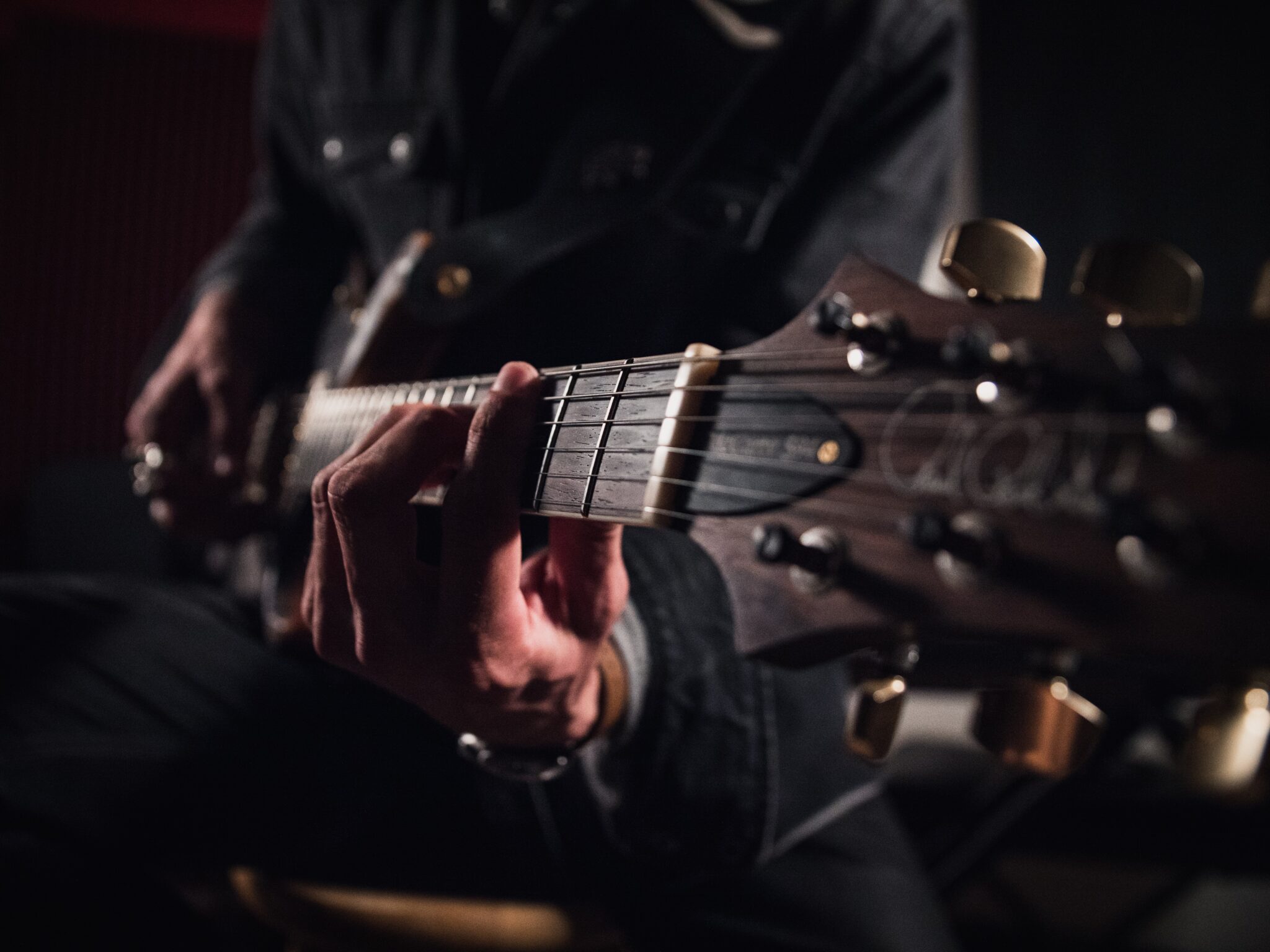 man holding a guitar